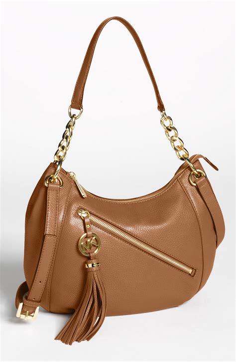 michael kors charm tassel bag|Michael Kors leather bags.